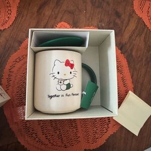 Hello Kitty Mug with Red Bow and Green Handle